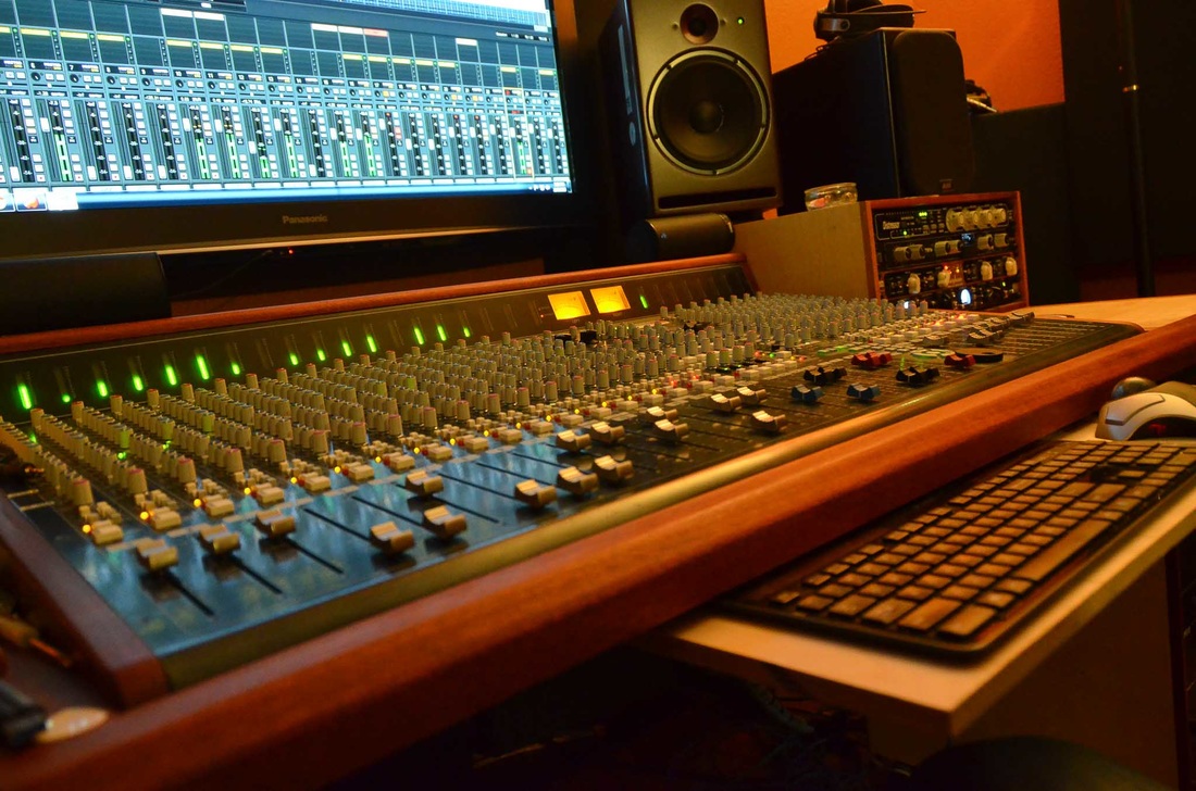analog mix console, flying faders, DAW